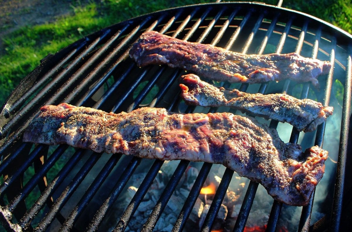 Skirt steak getting started on the grill. 