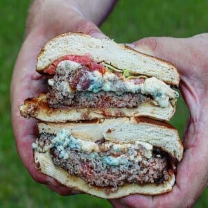 sliced in half bleu cheese bacon burger