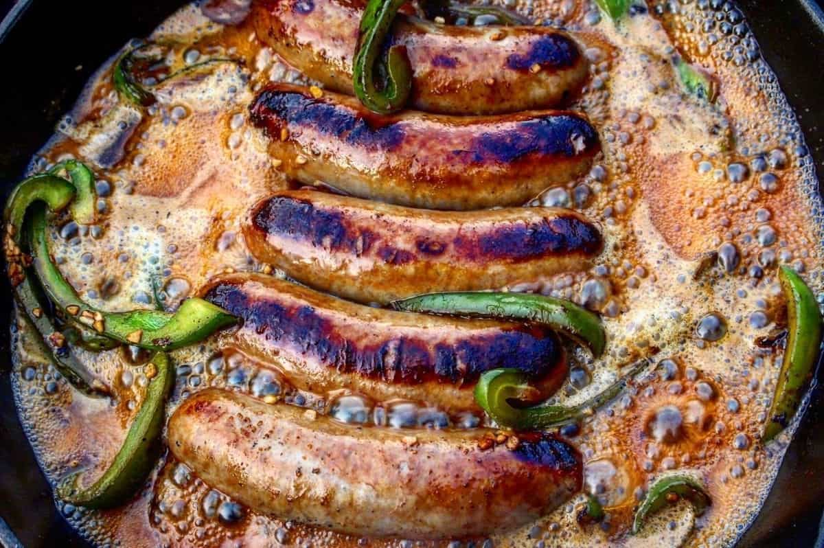 Cast Iron Brats with Peppers and Onions - Fresh Off The Grid