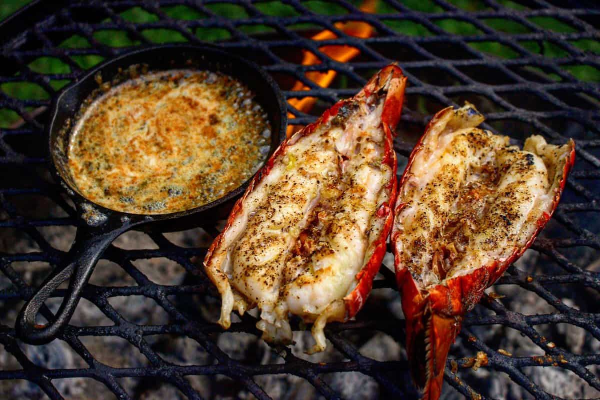 A shot of the lobster tails with the boiling butter sauce.