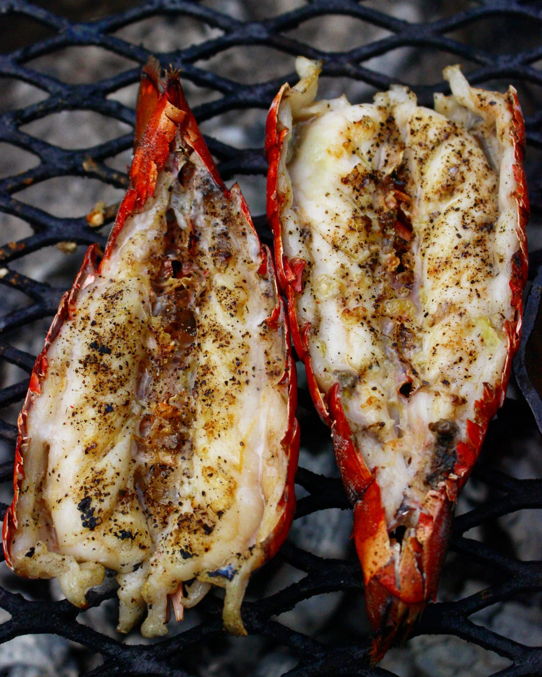 A close up of the Grilled Lobster Tail on the grill.