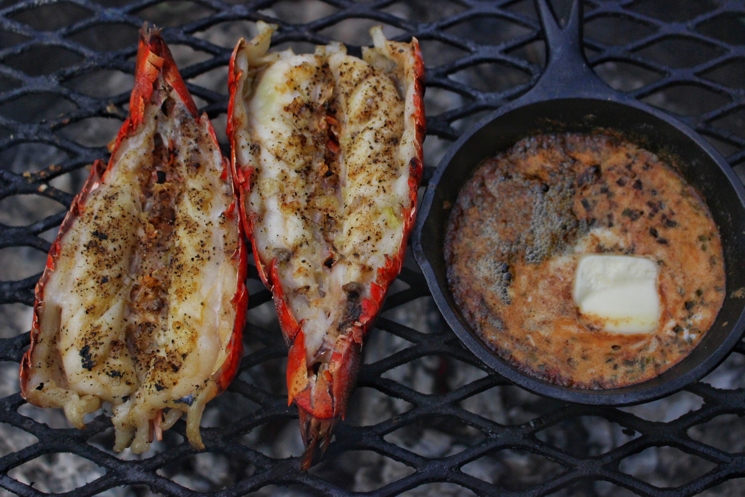 A picture of the full meal cooking on the grill grate.