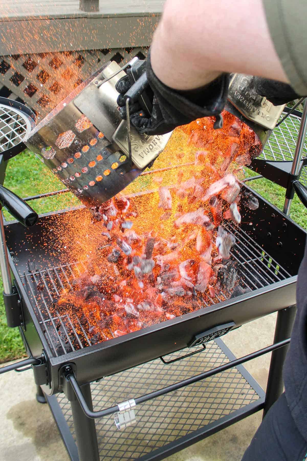 Dumping Cowboy Charcoal into the grill.