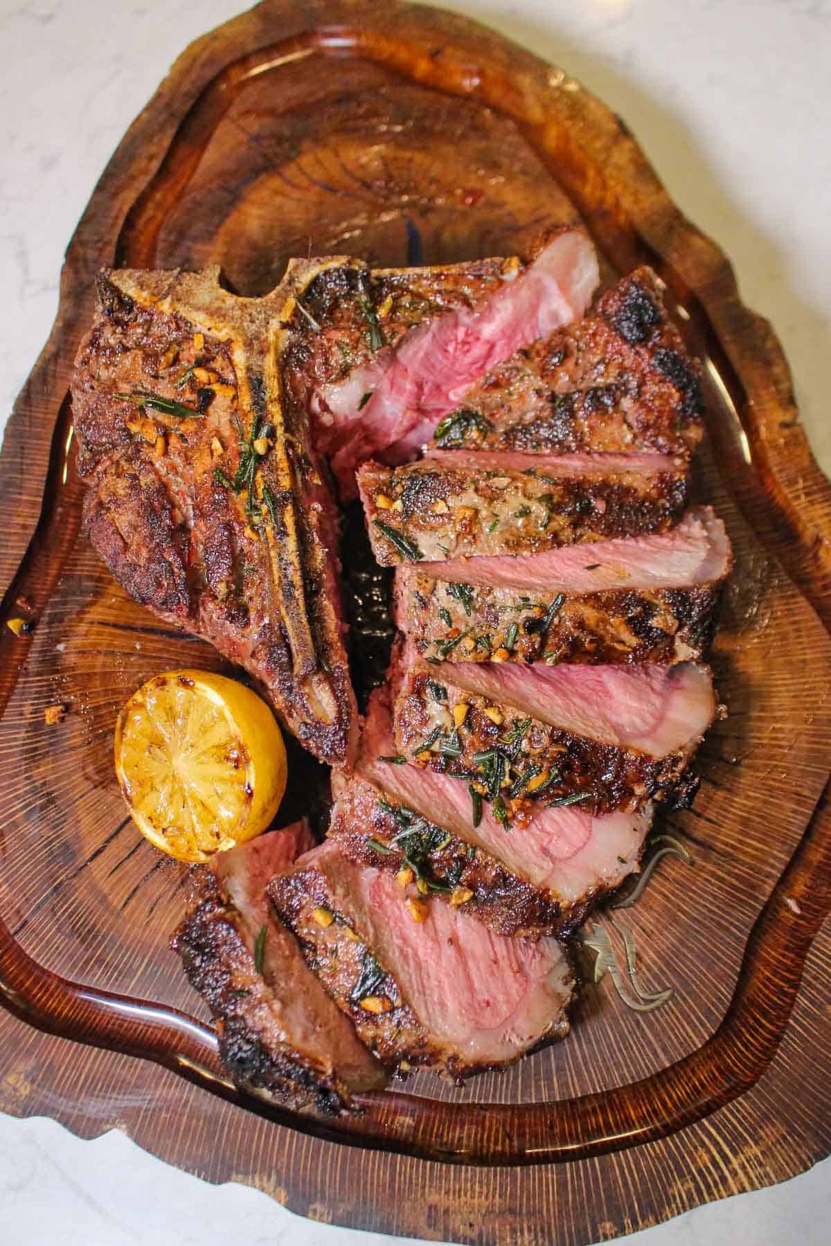 Reverse Seared T-Bone served on a cutting board.