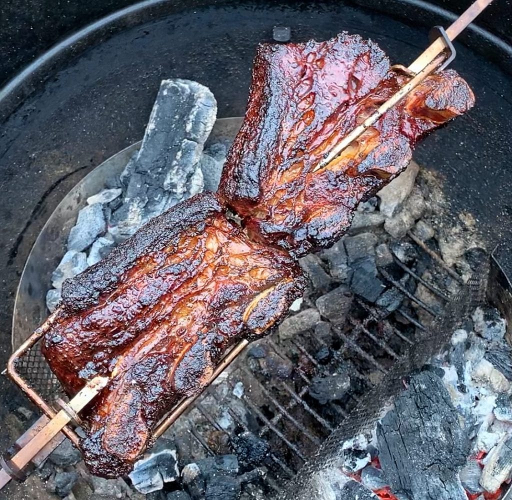 rotisserie smoked short ribs on the fire