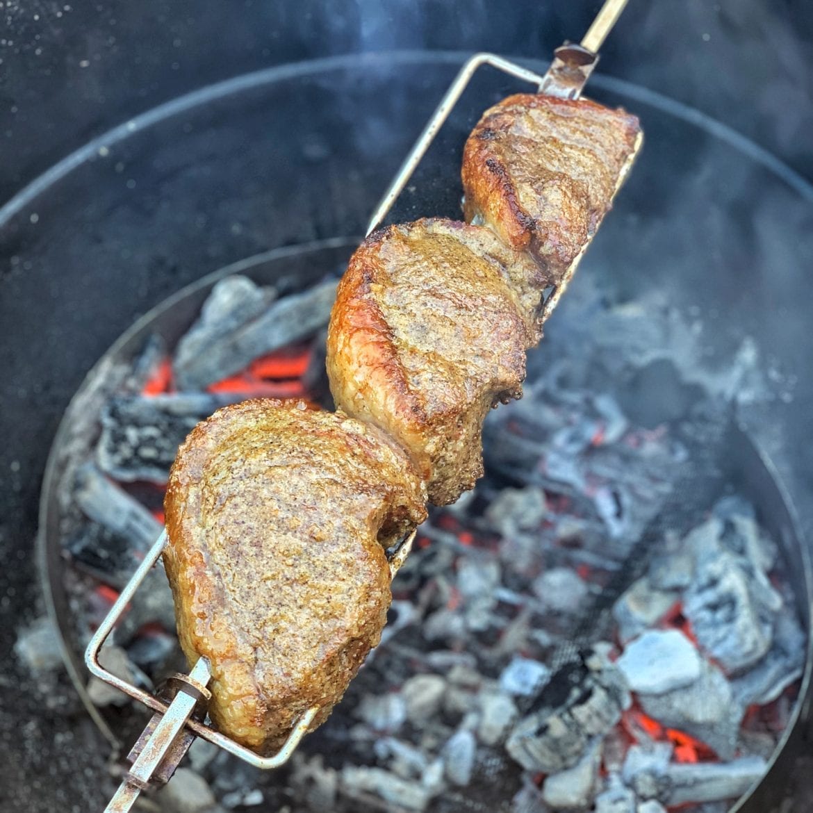 Brazilian steakhouse picanha on the rotisserie (rodizio)