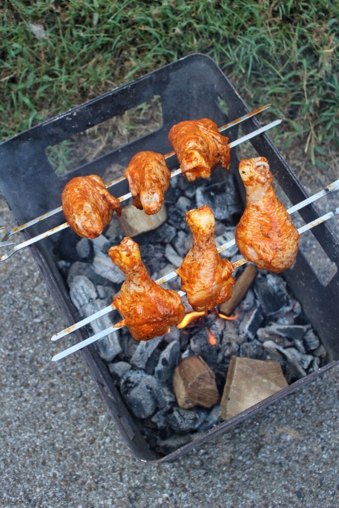 Roasted chicken leg on a fishing hook on Craiyon