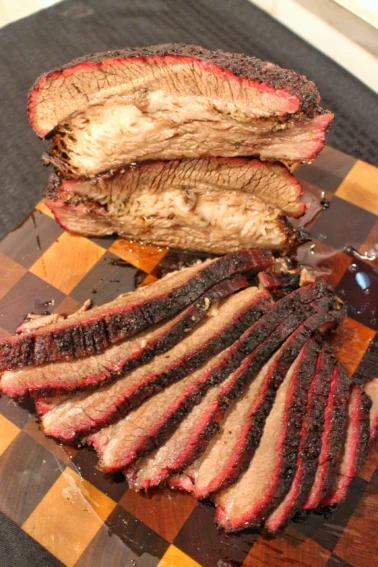 The hot and fast brisket sliced and served.