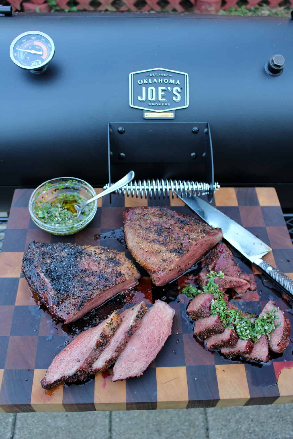Smoked Picanha with Spicy Smoked Chimichurri drizzled over the top.