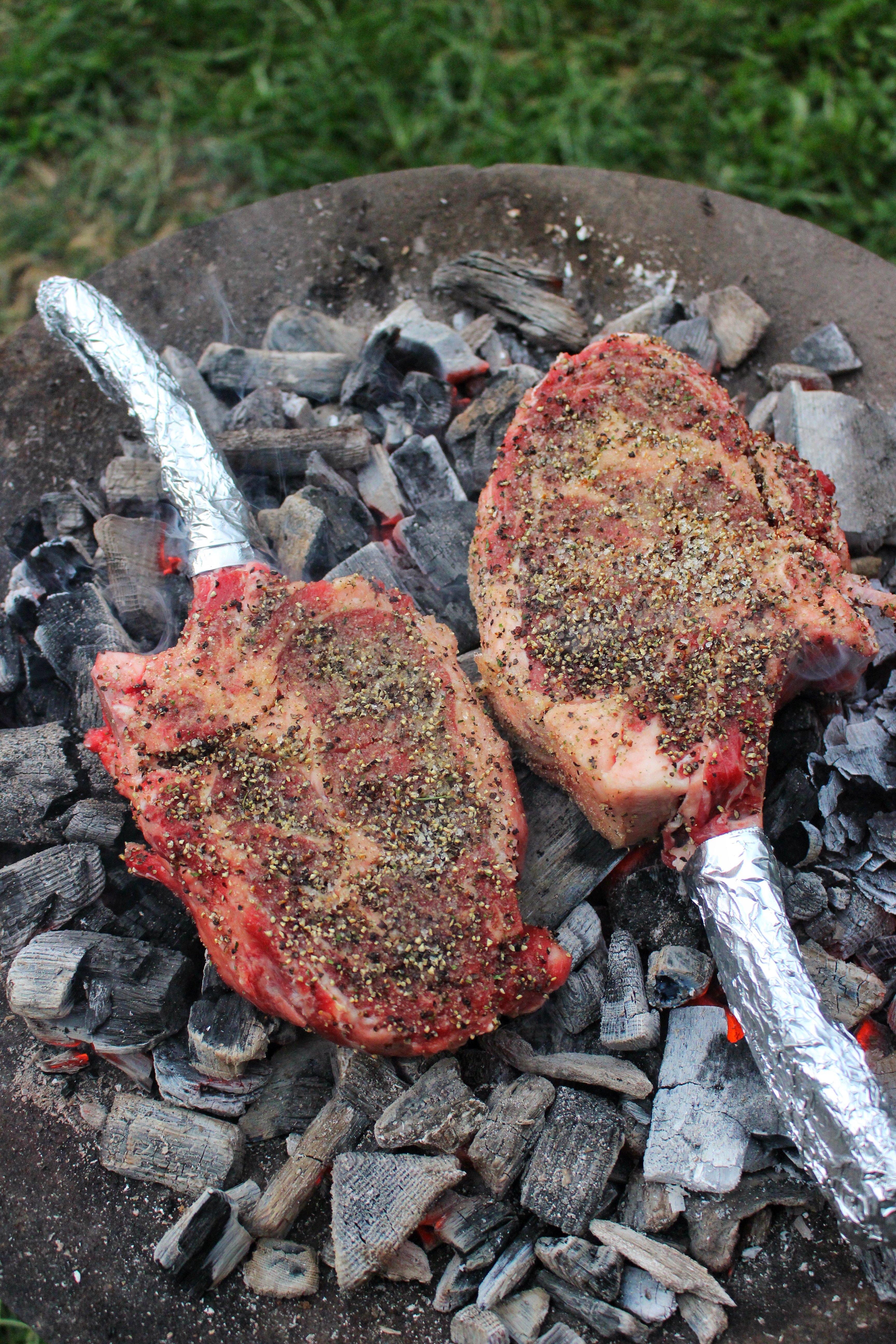 Dirty Tomahawk Steaks with Steakhouse Butter