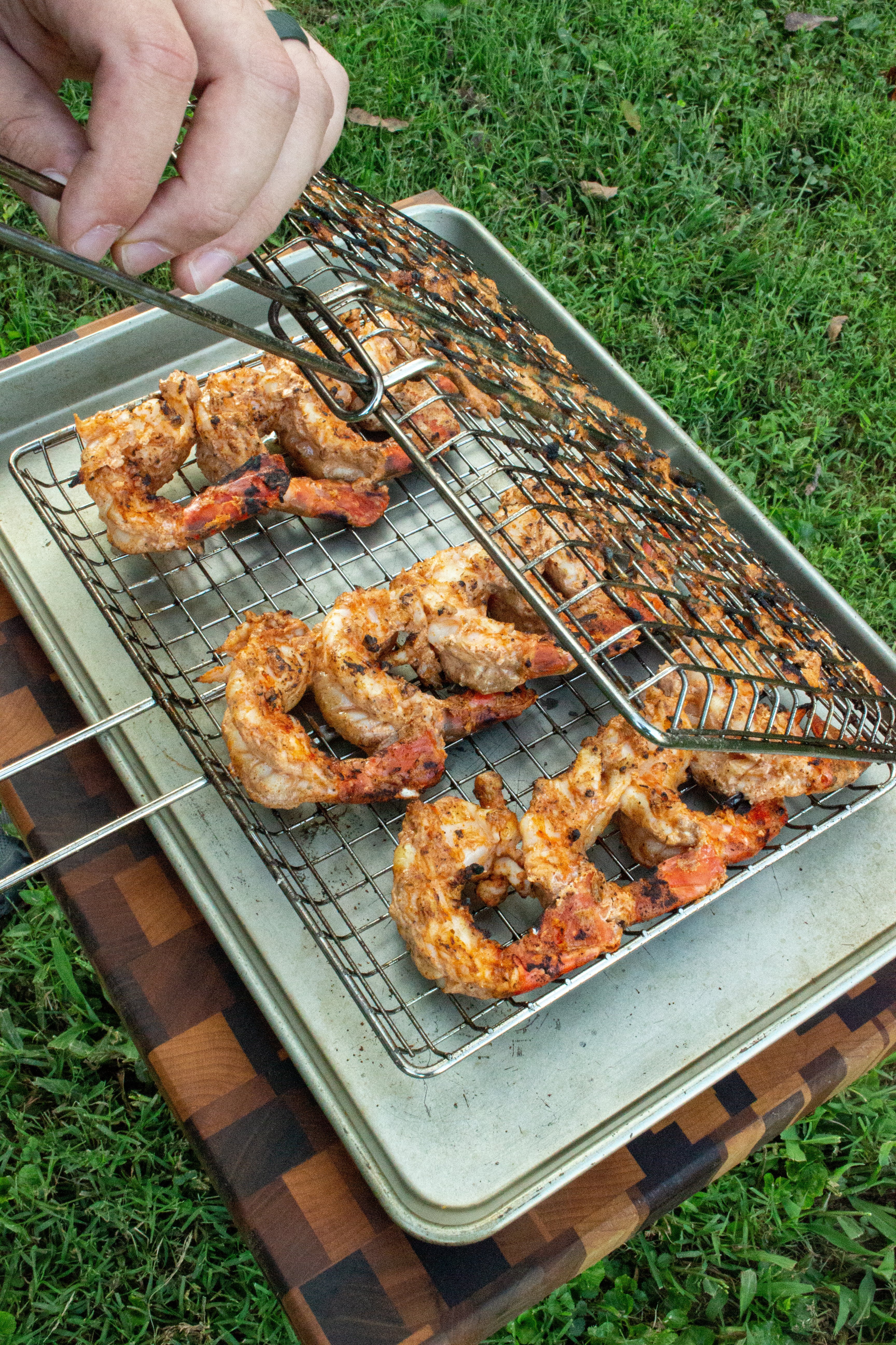 Opening up the grill basket. 