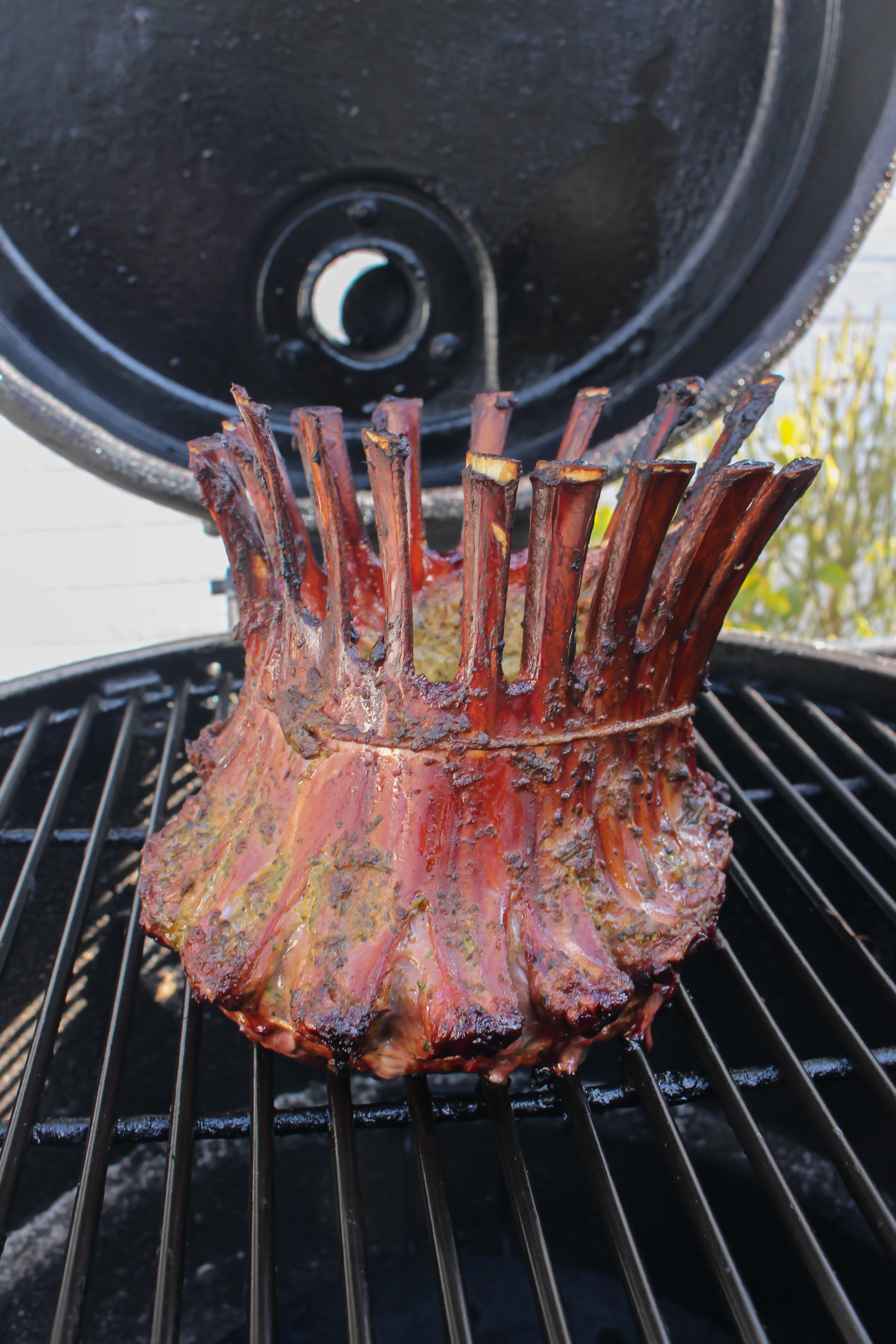 The dish sitting on the smoker. 