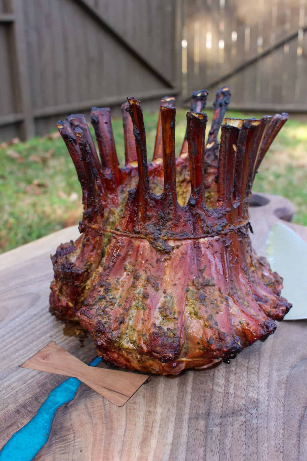 The crown sitting on a cutting board after it's finished smoking. 