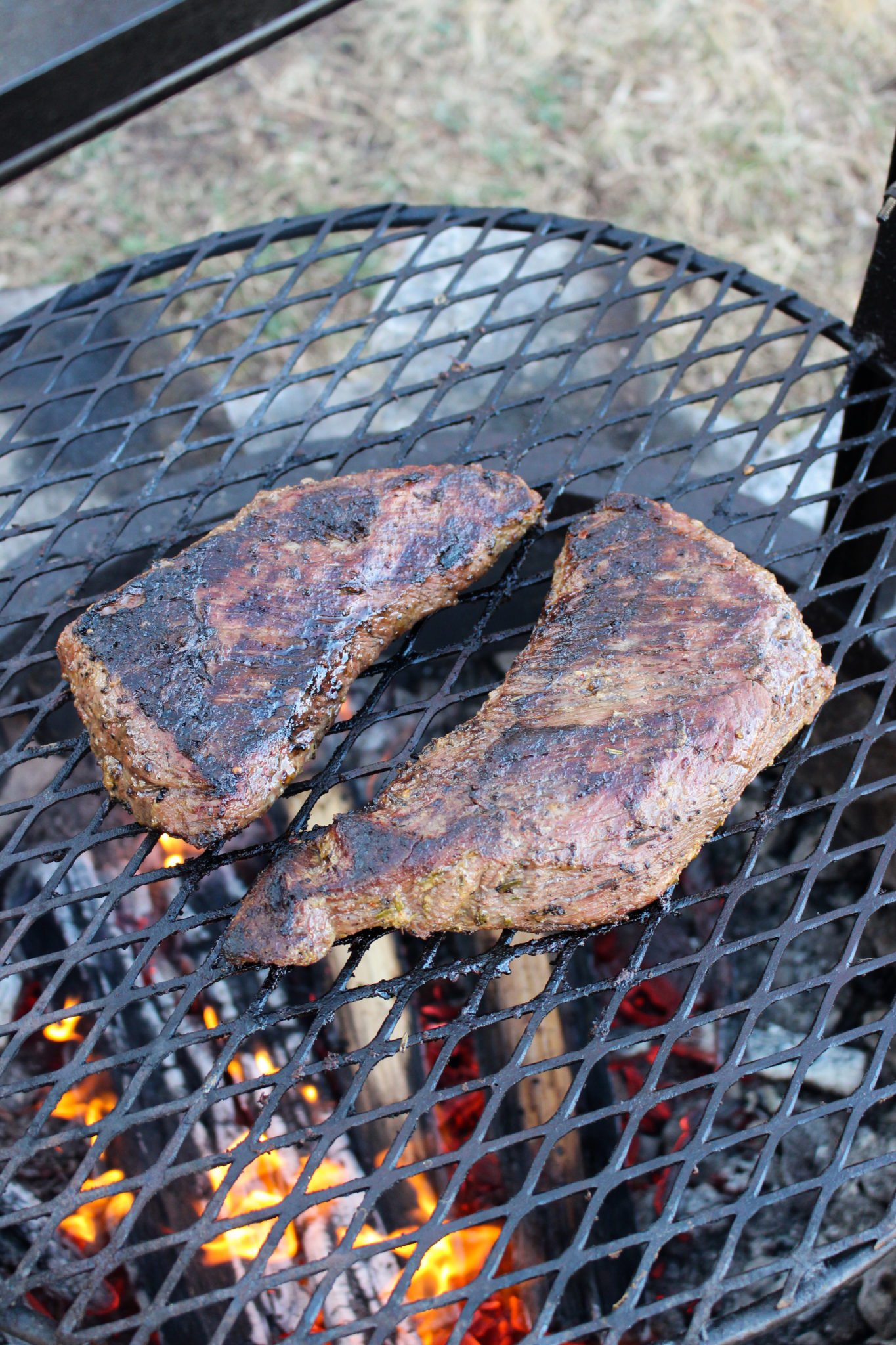 The finished Grilled Santa Maria Tri-Tip on the grill grates.