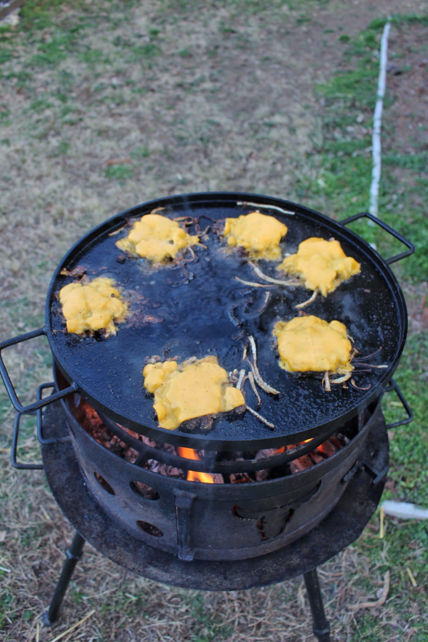 Cheesy Onion Smash Burgers - Over The Fire Cooking