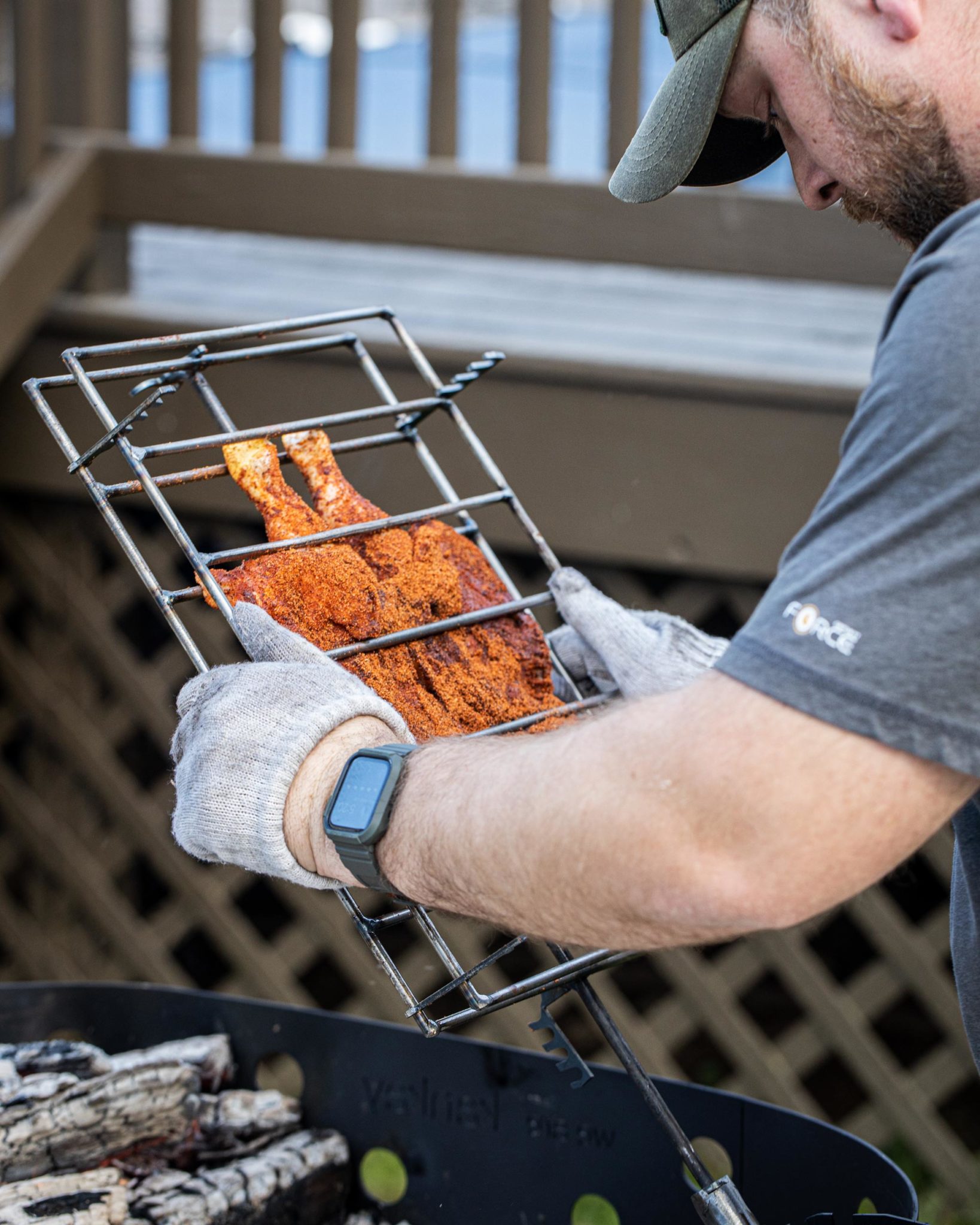 Hot Honey Chicken Asado getting secured over the fire.