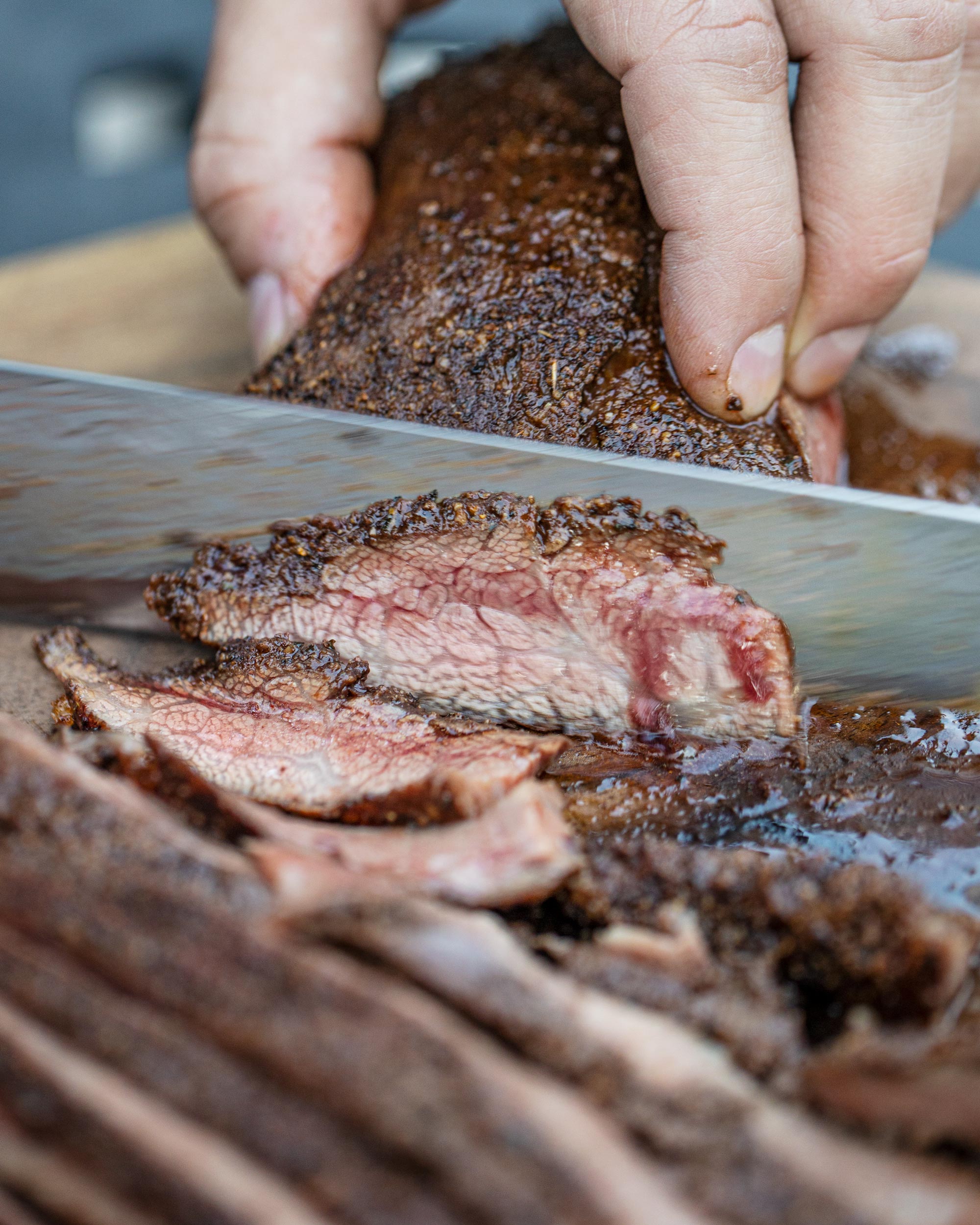 Slicing into the flank steak.