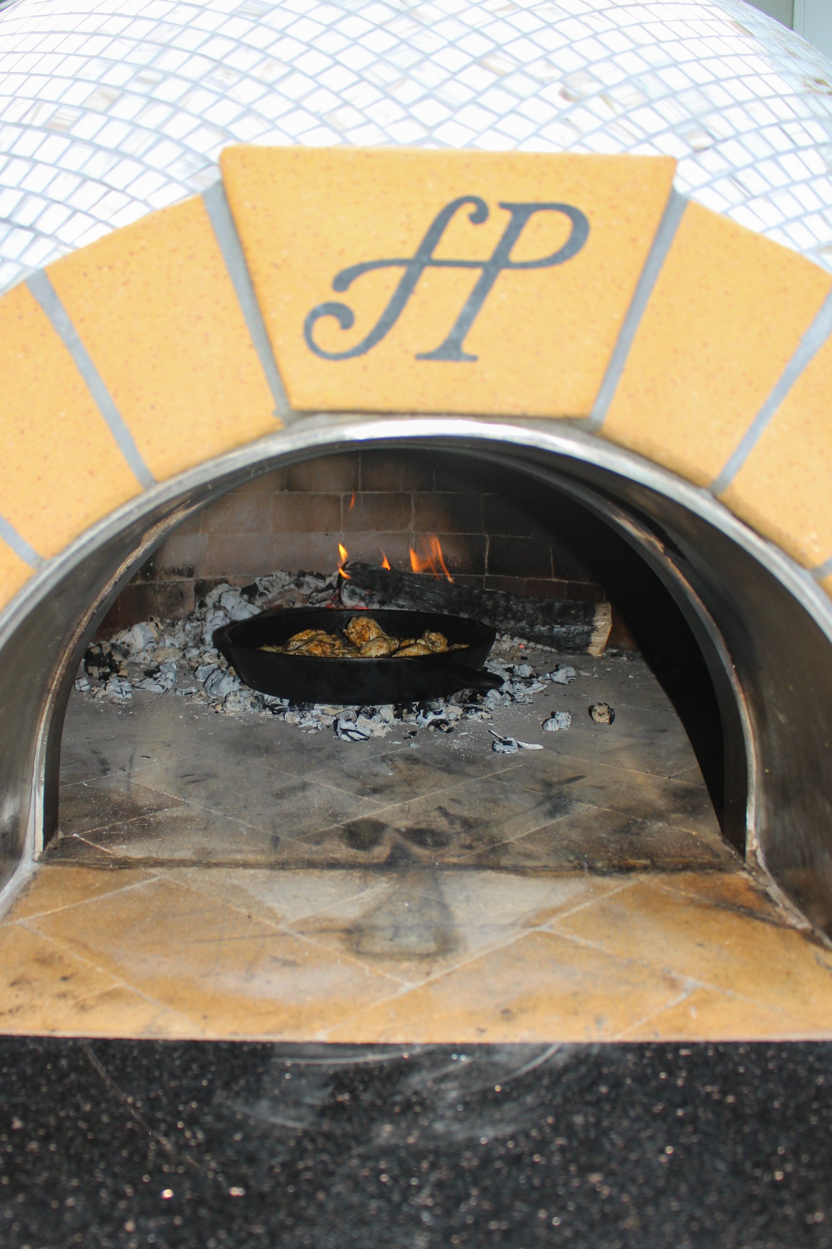 Fire Baked Chimichurri chicken Wings in the pizza oven.