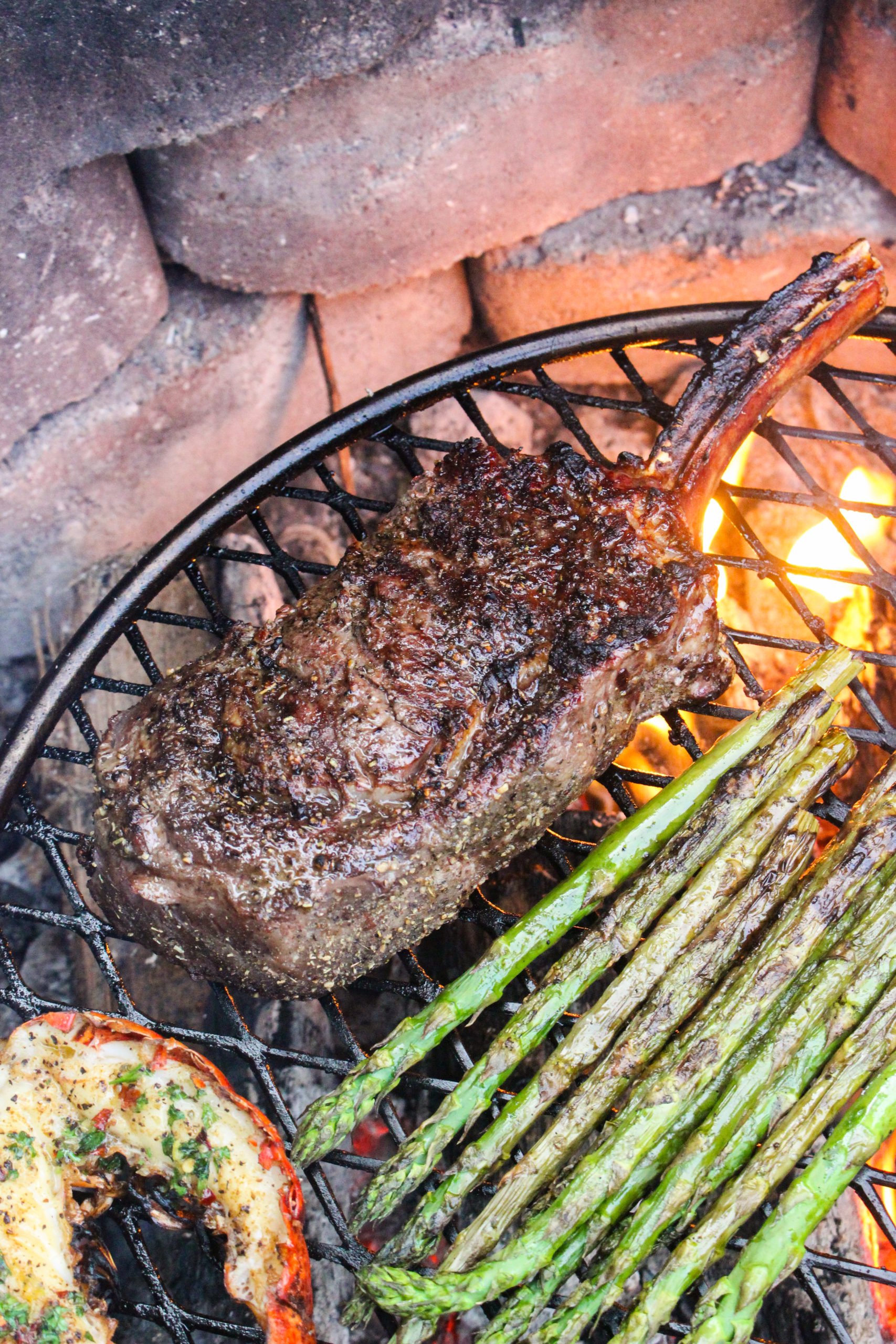 Bison Ribeye and Lobster Tails