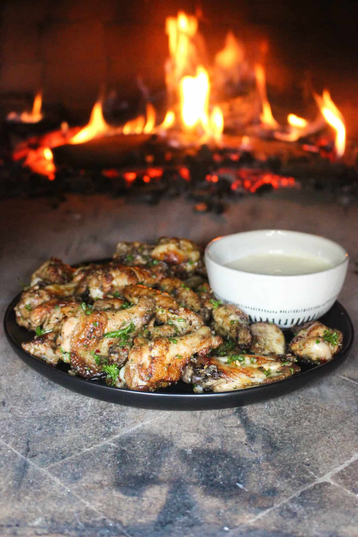 The finished dish sitting in front of the fire. 