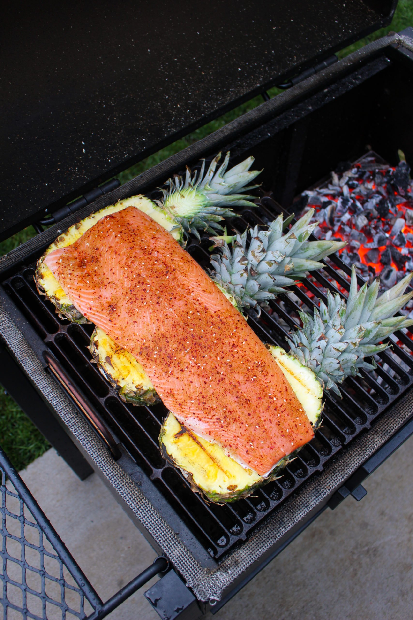 The raw salmon getting started on the Oklahoma Joe grill. 