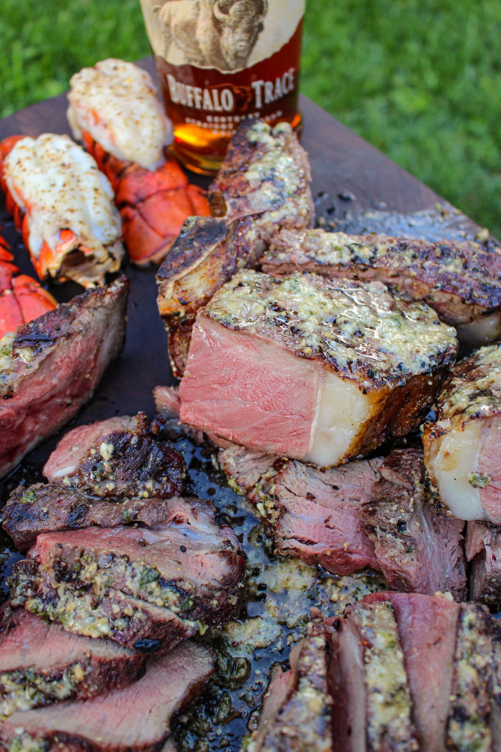 A shot of the sliced and served grilled surf and turf.