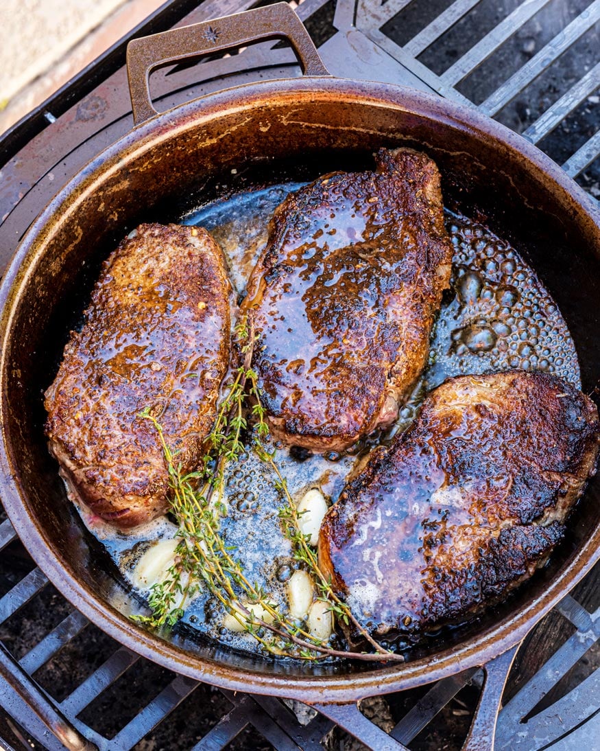 NY Strip Steaks almost done cooking