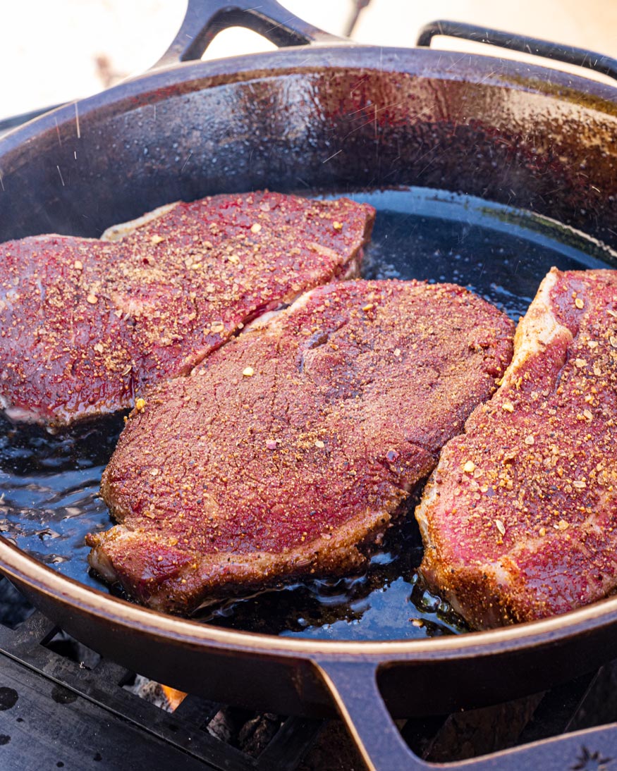 NY Strip Steaks Cooking in the skillet