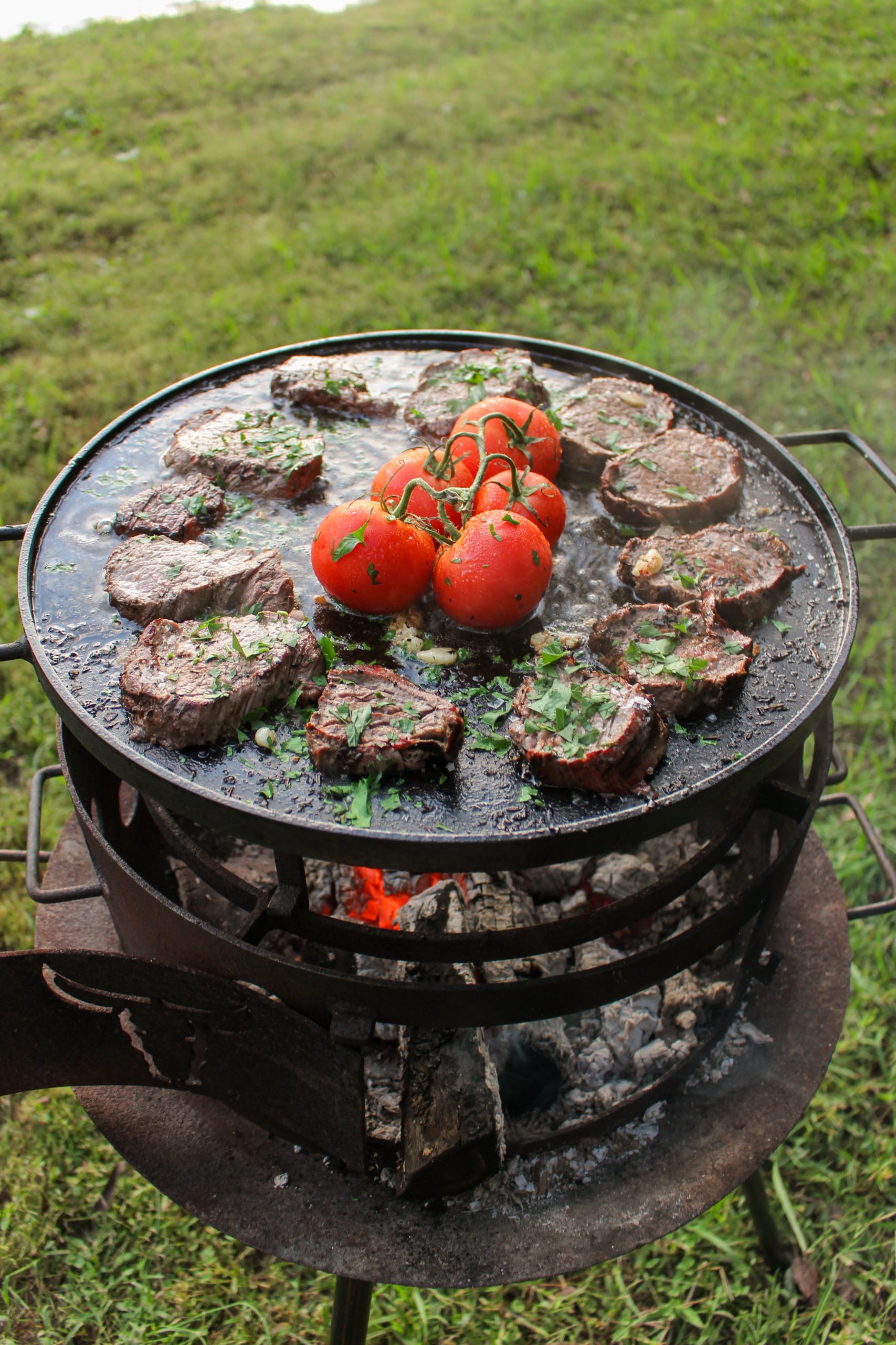 Salt Bae Steak that's cut and cooking in ghee.