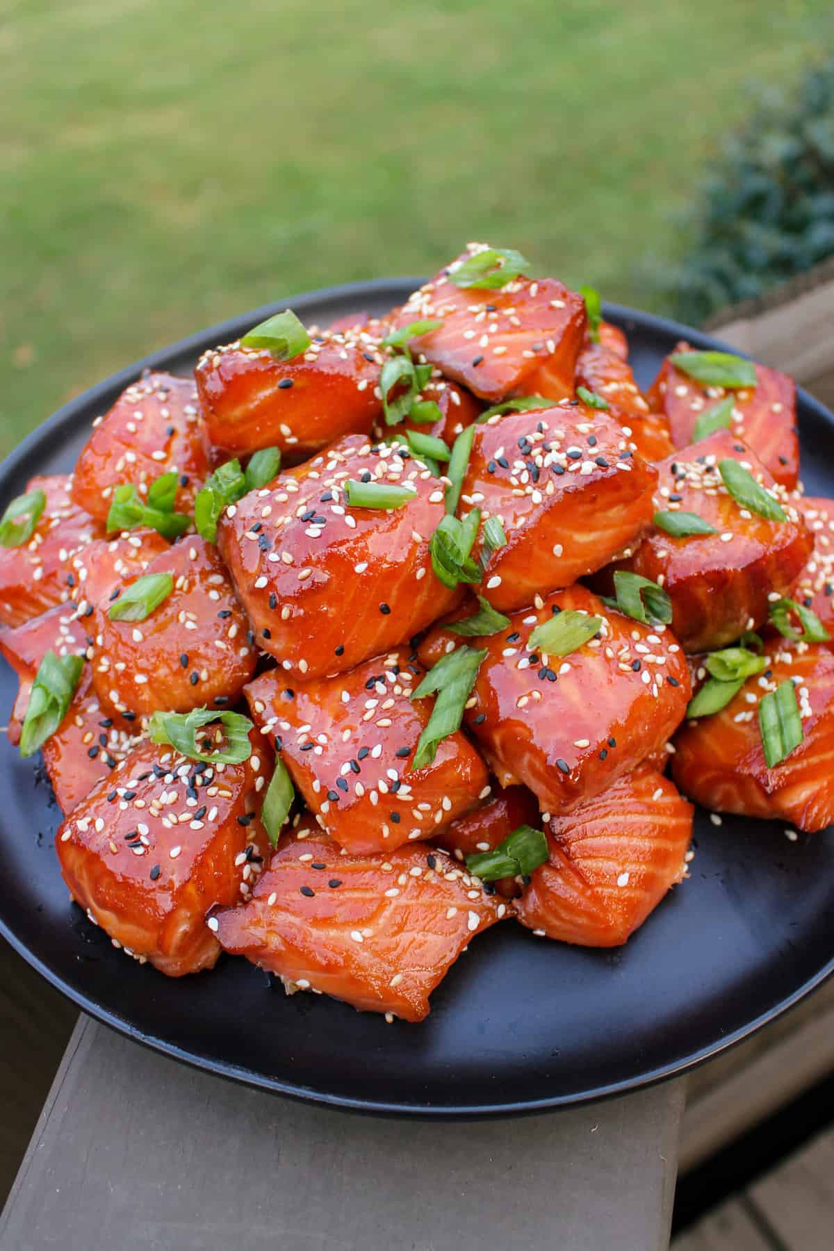 Smoked Salmon Burnt Ends garnished and served.