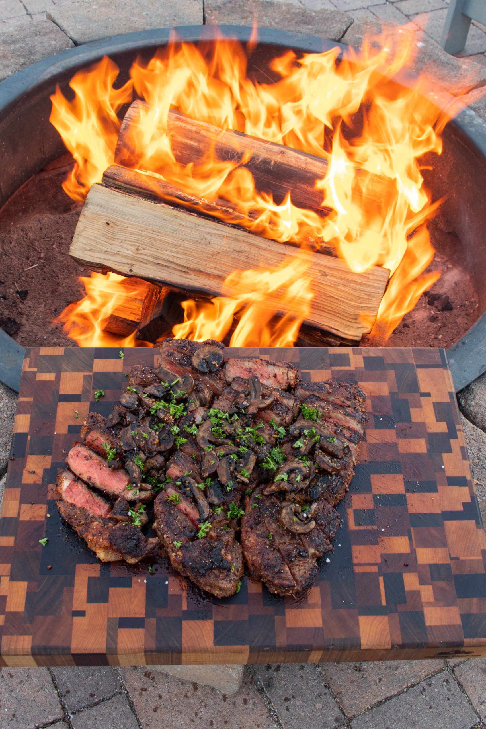 New York Strips with Bourbon Mushrooms by the fire.