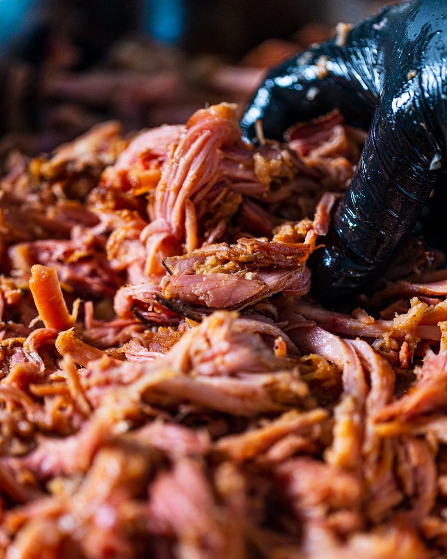 Smoked Pulled Ham Sandwiches getting pulled.