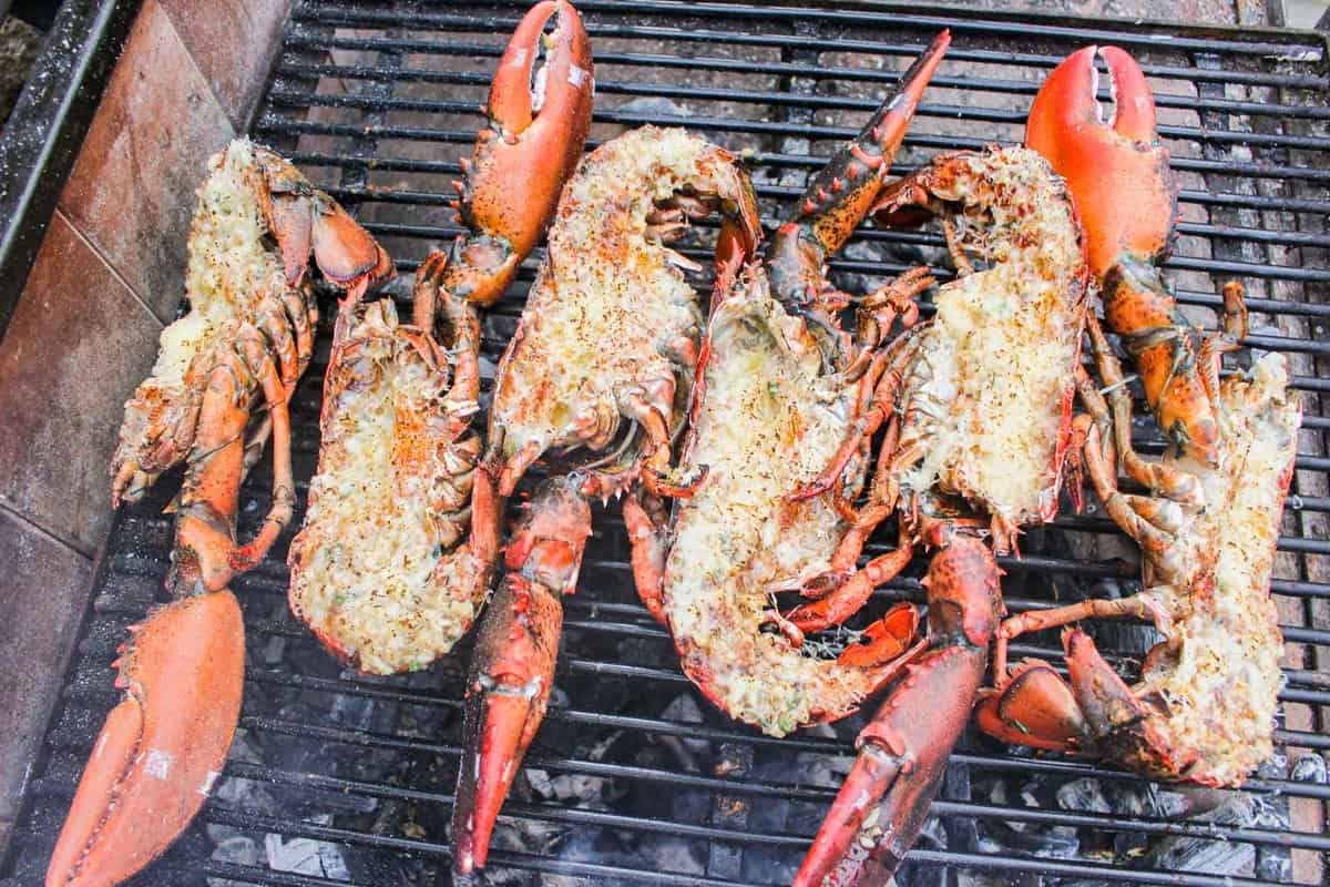 The uncooked lobsters hitting the grill.
