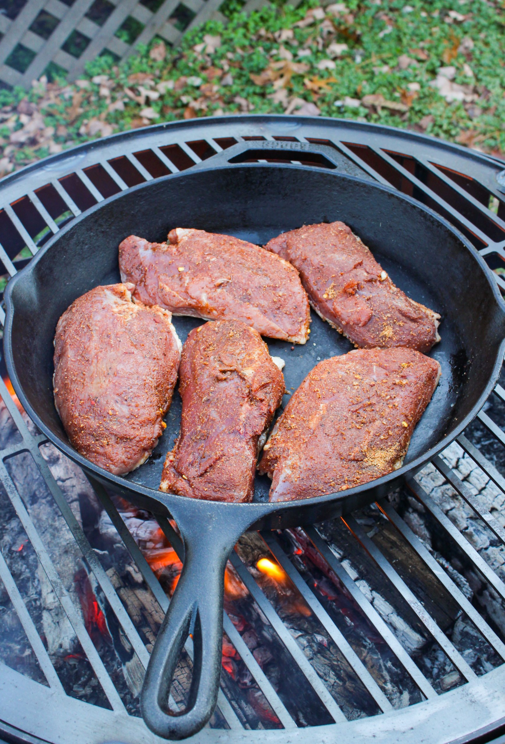 Seared Duck Breast in the skillet on the grill.