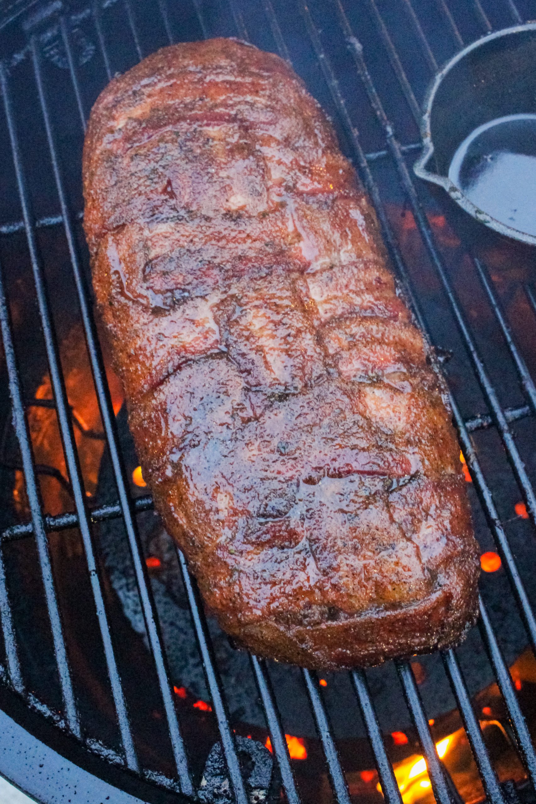 Chorizo Breakfast Fatty that's glazed and almost done cooking.