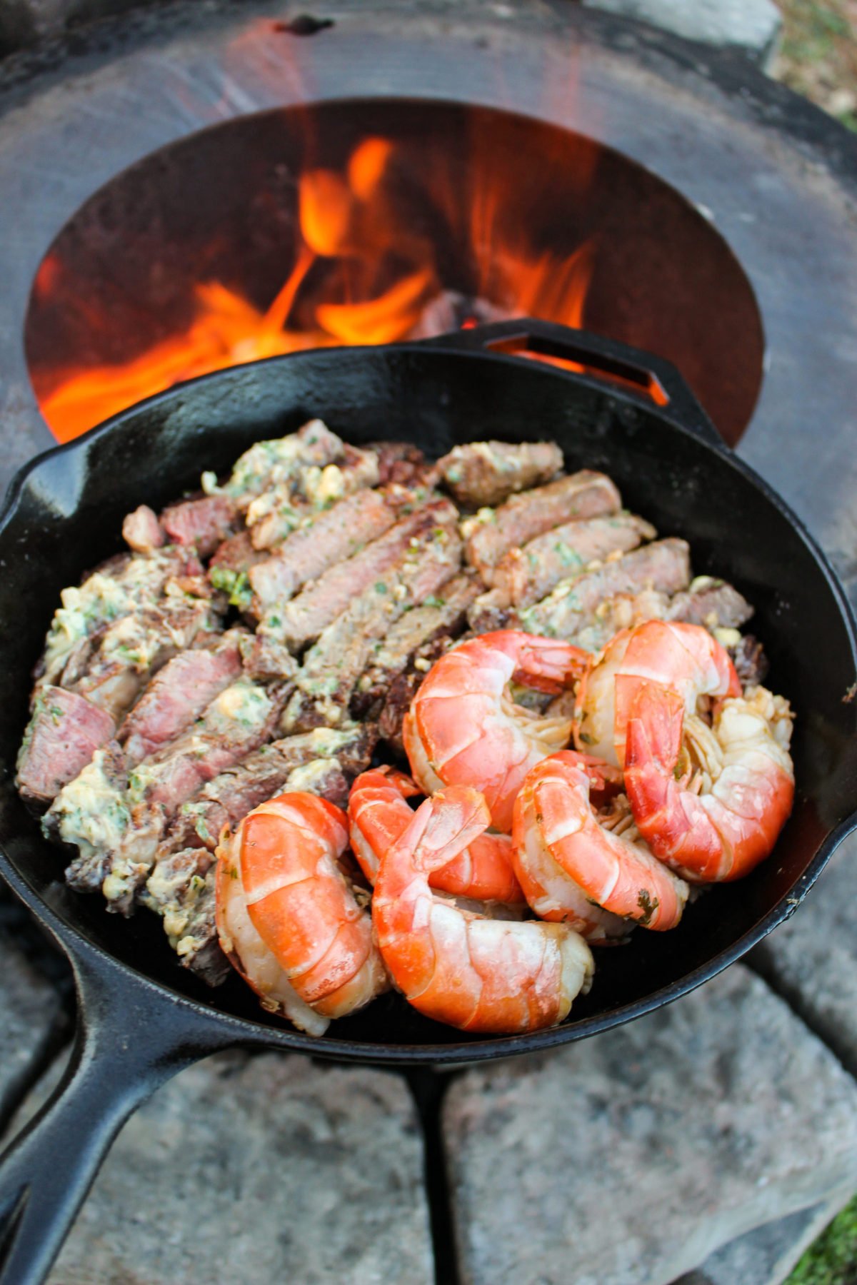 Garlic Butter Steak and Shrimp cooked and gathered in the skillet. 