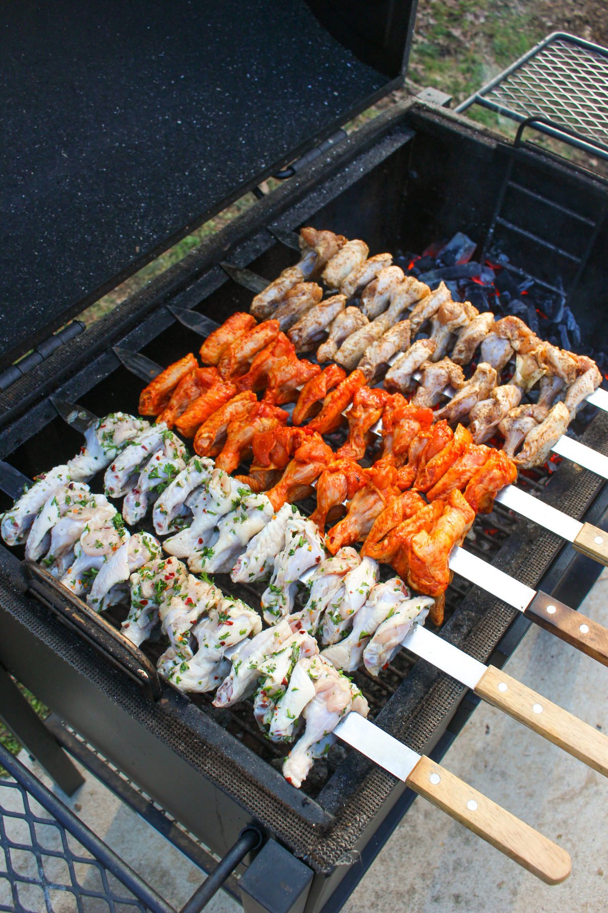 Chicken Wing Skewers get set on the grill. 