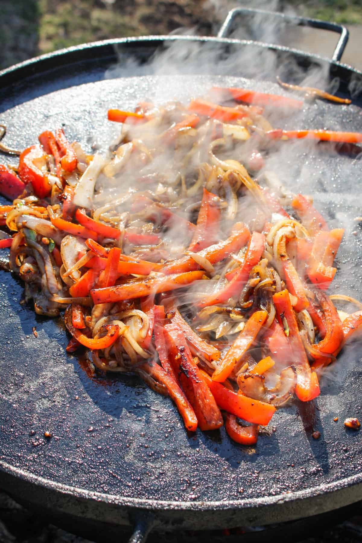 Sautéing the onions and peppers. 