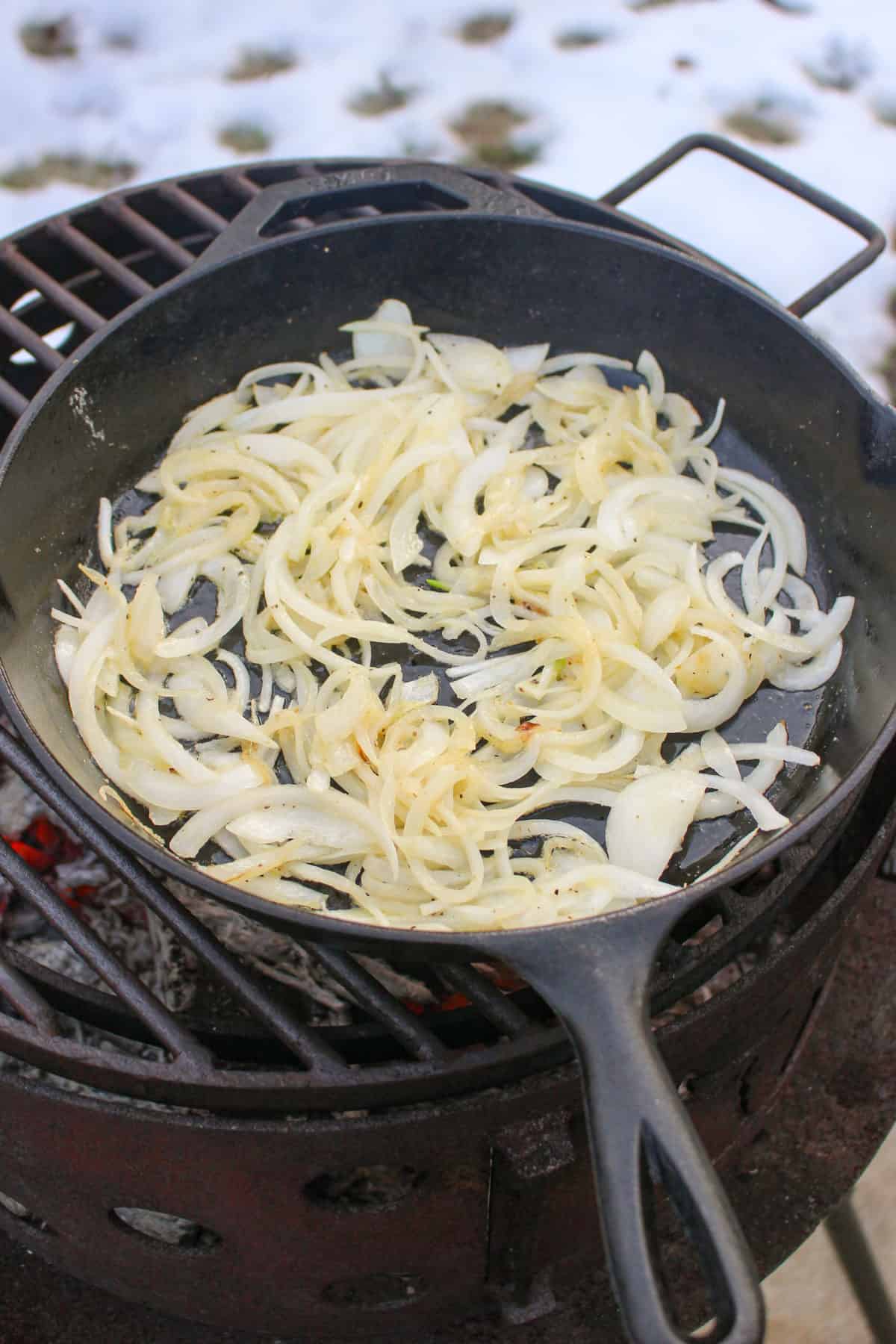 Getting started by sautéing onions.