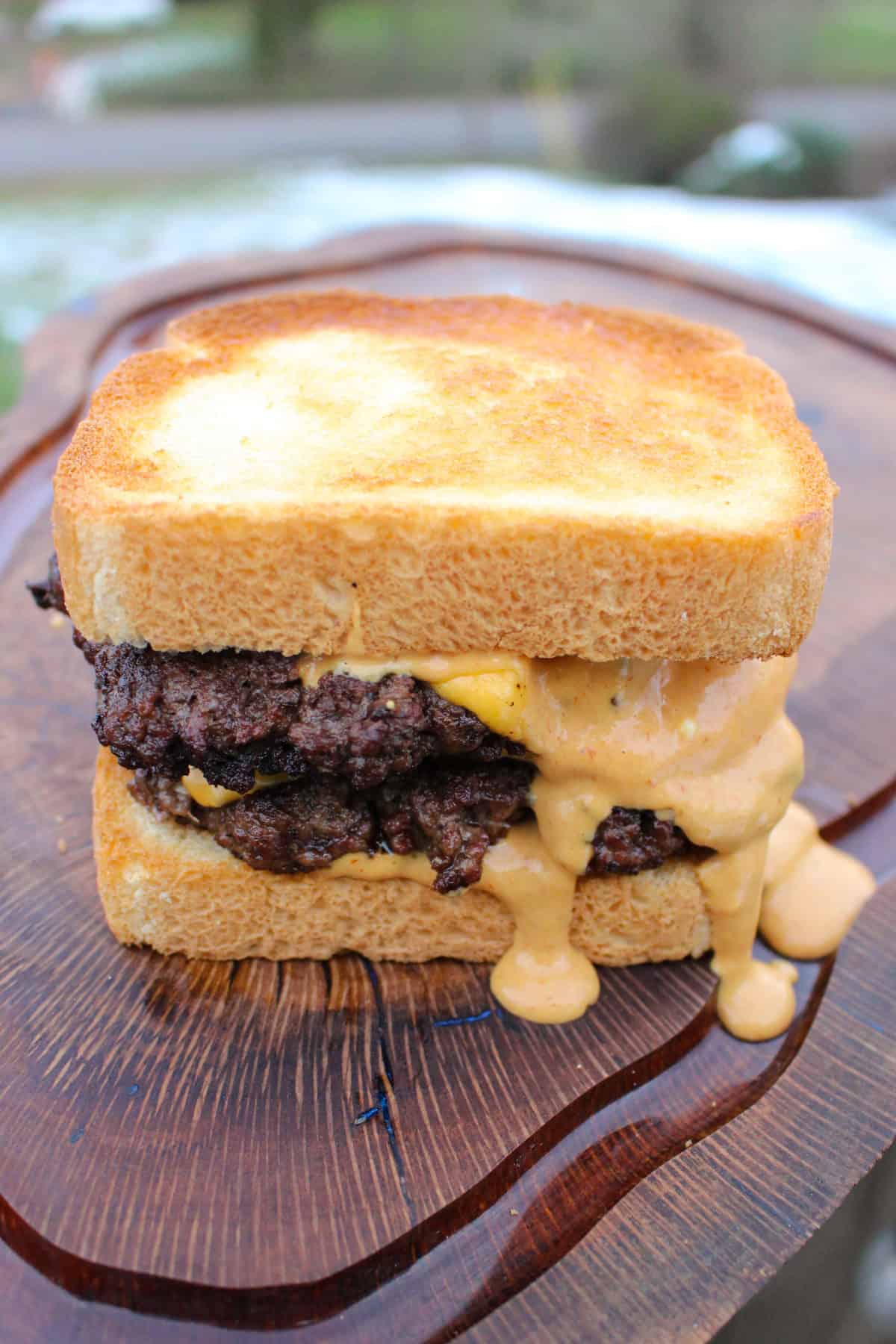 Chopped Texas Patty Melt with oozing cheese.