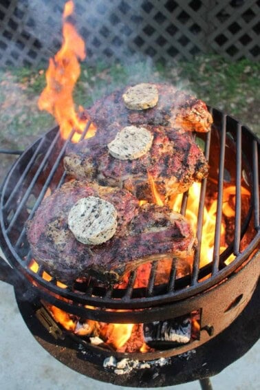 Reverse Seared Ribeyes with butter melting on top.