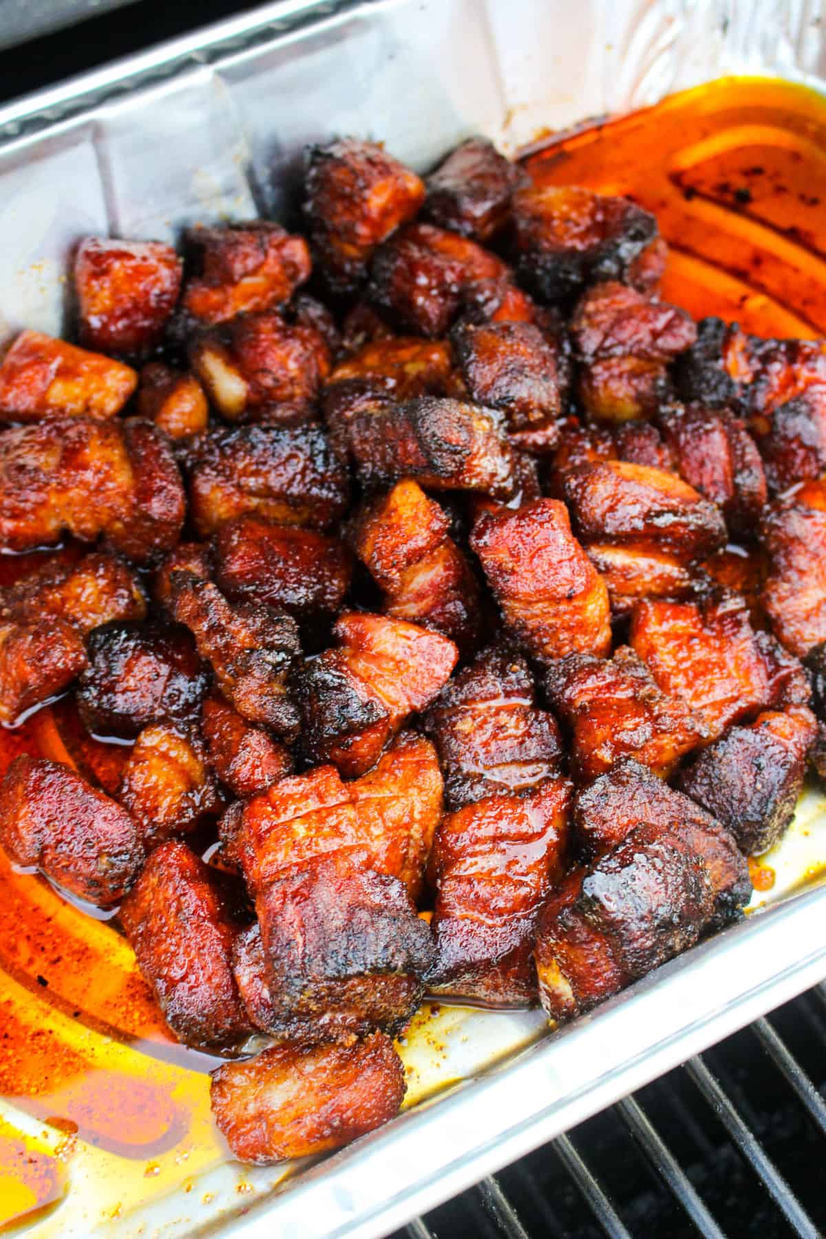 Honey Garlic Pork Belly Burnt Ends about to be pulled from the smoker.