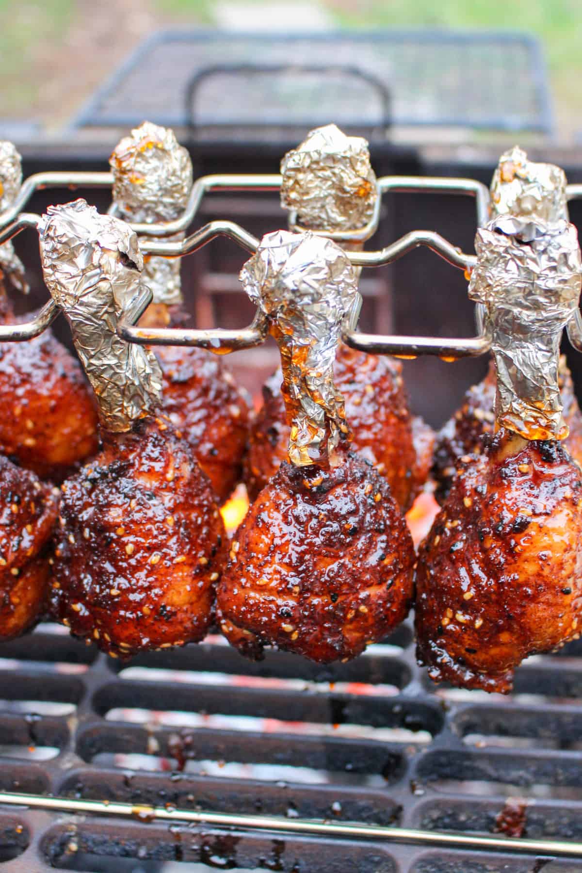 A close up shot of the chicken lollipops after being glazed.