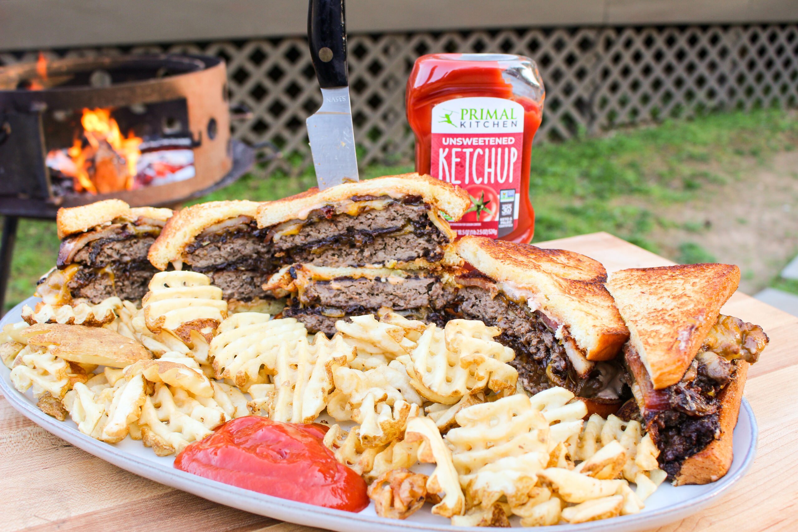 The melts and fries sitting on a serving platter.