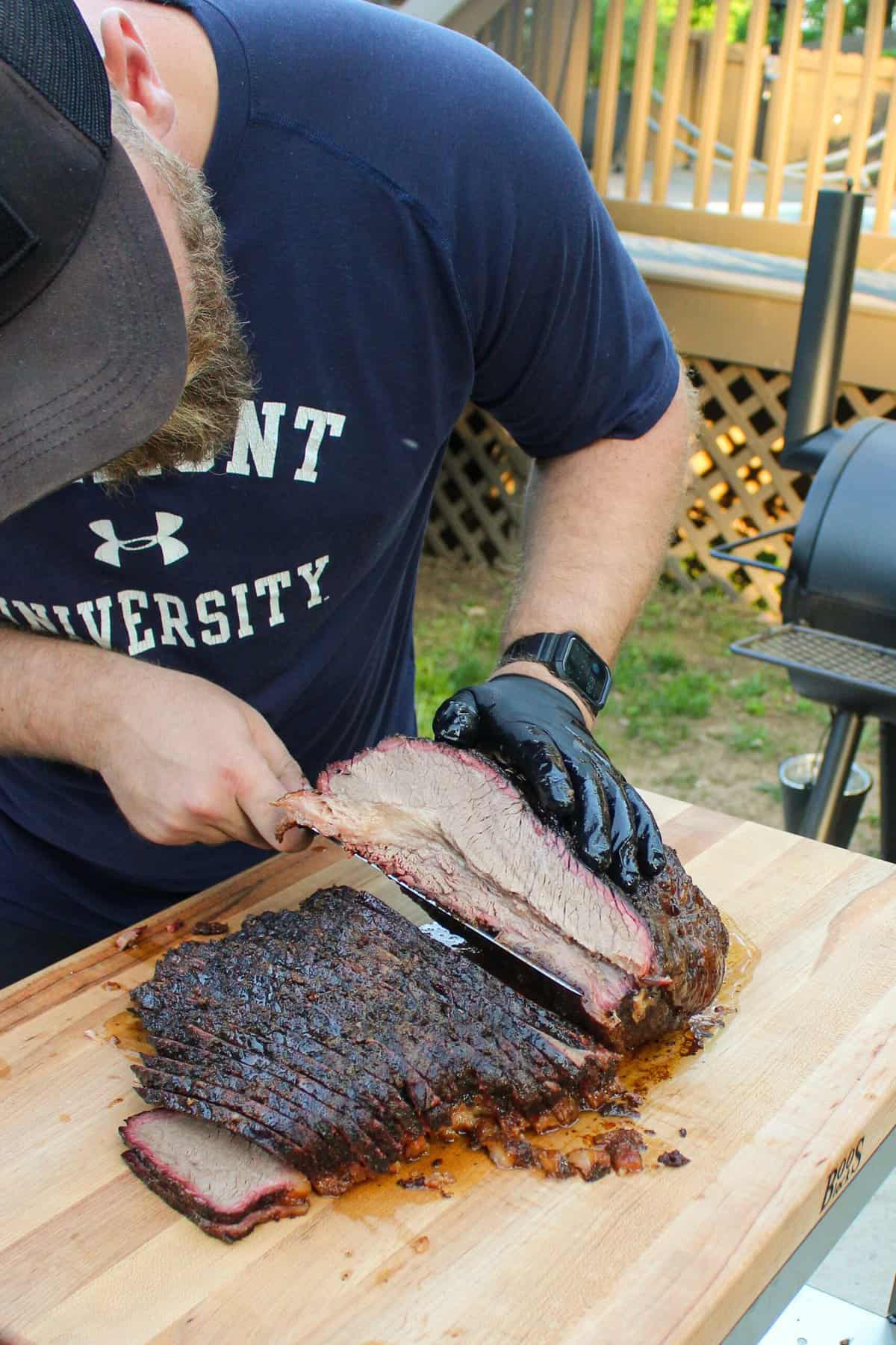 Derek slicing into the brisket.