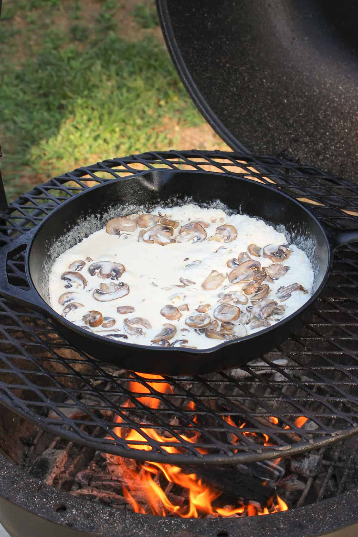 side view overhead of a skillet with cream sauce