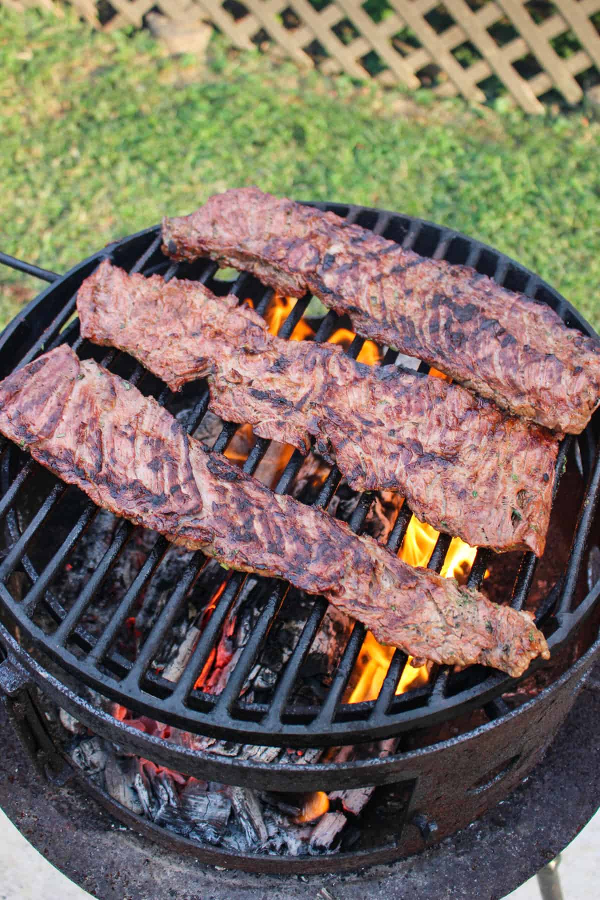 cooked steak on a grill from above