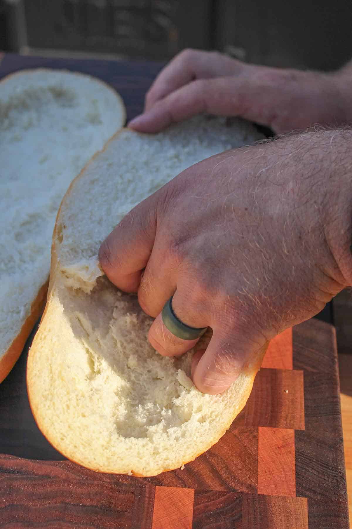 bread being hollowed out