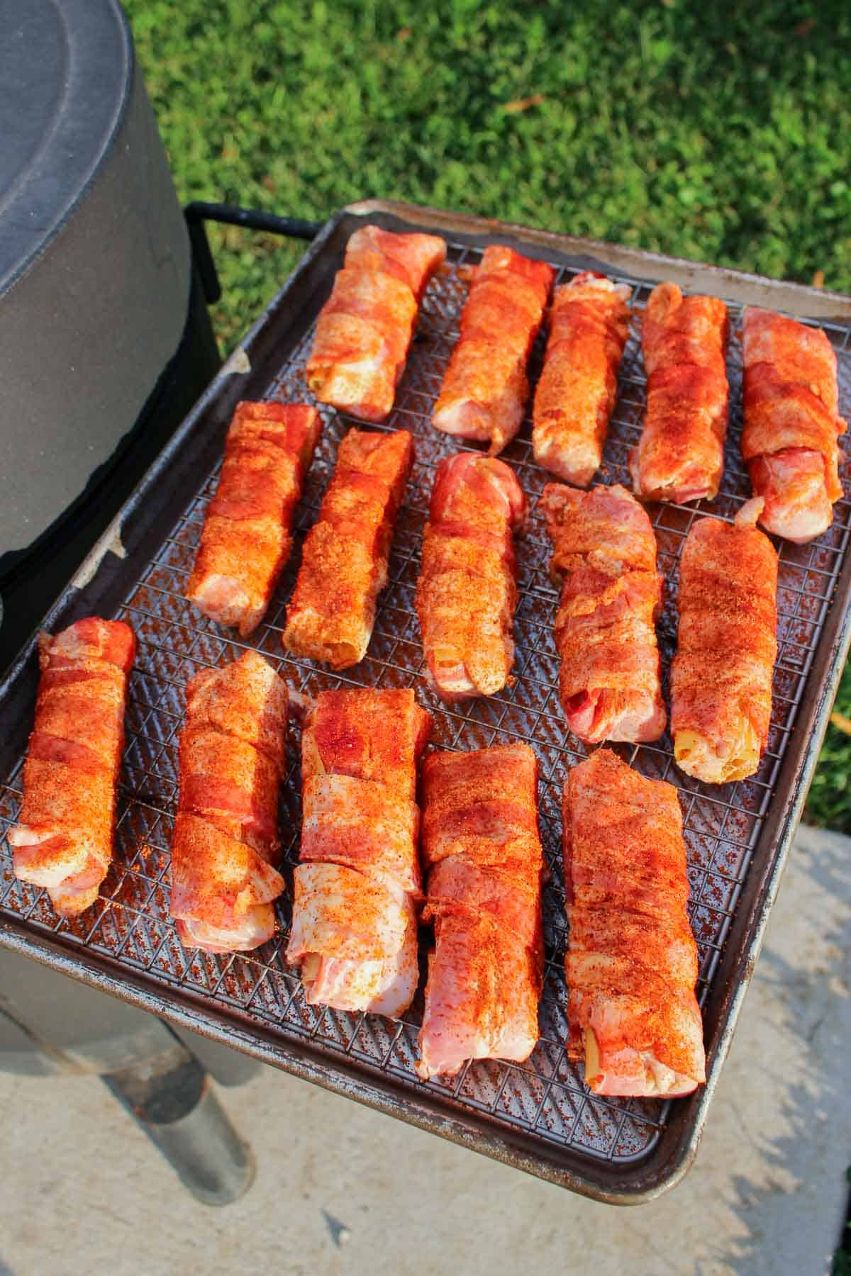 assembled shotgun shells lined on a baking sheet