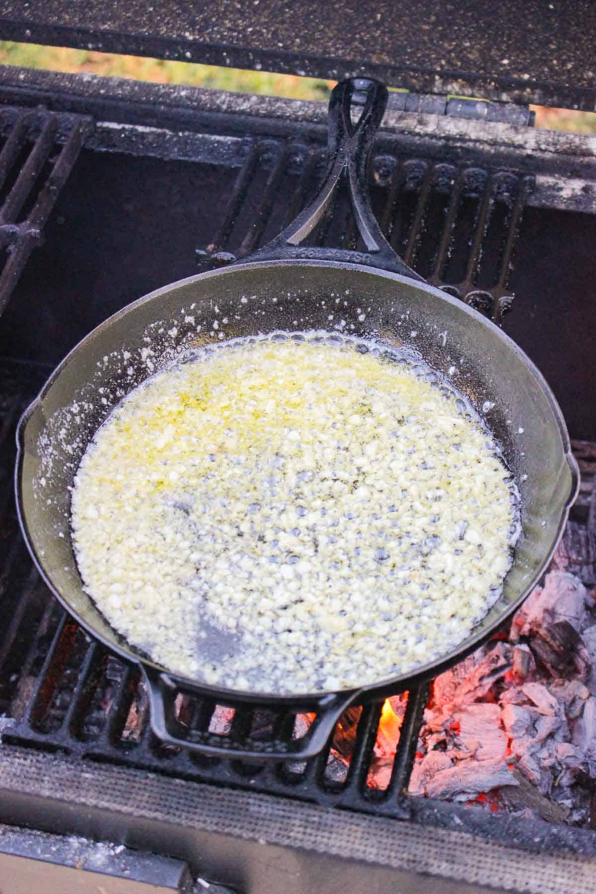 The butter and garlic simmering over the fire.